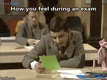 gif of Mr Bean sitting an exam and looking shocked at the questions